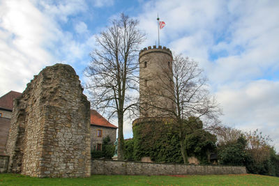 Low angle view of historic building against sky