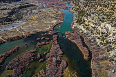 High angle view of river amidst rocks