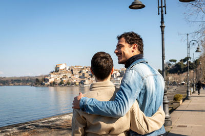 Couple traveling to anguillara sabazia in italy.romantic atmosphere and copy space for your message.