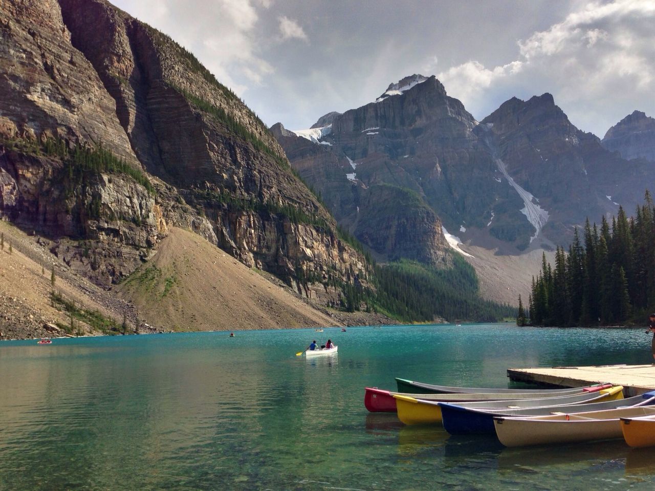 mountain, water, nautical vessel, boat, mountain range, tranquil scene, scenics, tranquility, beauty in nature, sky, transportation, nature, sea, mode of transport, lake, waterfront, idyllic, cloud - sky, cloud, travel