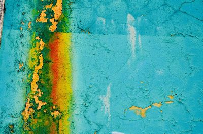 Full frame shot of multi colored weathered wall
