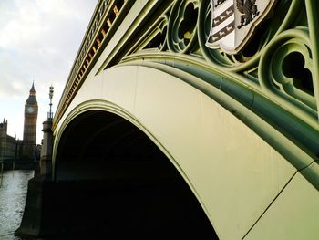 Close-up of westminster bridge over thames river by big ben