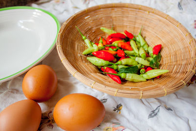 Close-up of fruits in basket on table