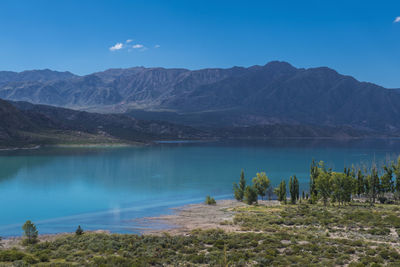 Lake embalse potrerillos and mountains, uspallata, mendoza, argentina