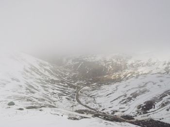 Snow covered mountain against sky