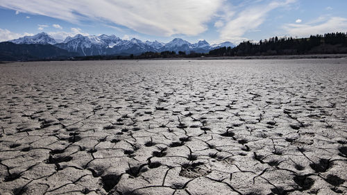 Dried out lake with alps