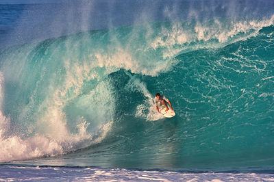 Man surfing in sea