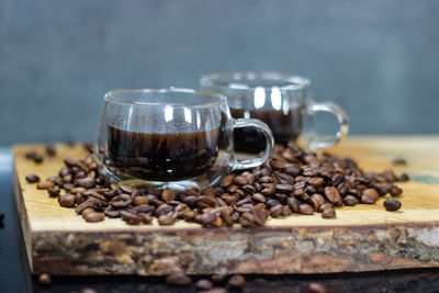 Close-up of coffee beans on table