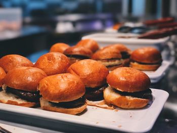 Close-up of burgers in plate on table