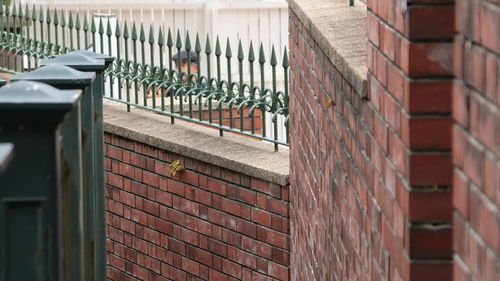 Metal grate on wall of building