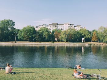 People relaxing in lake