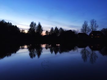 Reflection of trees in lake