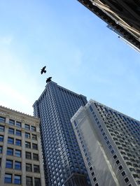 Low angle view of modern building against sky