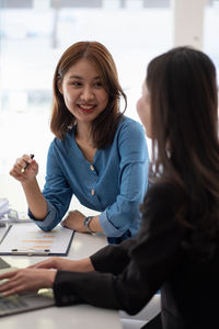 Young woman using mobile phone