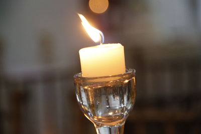 Close-up of burning candle