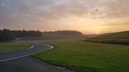 Scenic view of landscape against sky during sunset