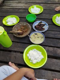 High angle view of person preparing food on table