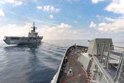 Ships in sea against sky