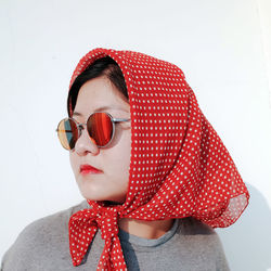 Portrait of young woman wearing sunglasses