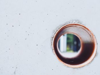 Concrete wall with hole and fitted pipe