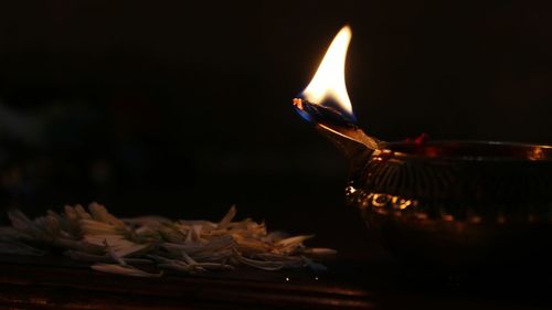 Close-up of burning candle