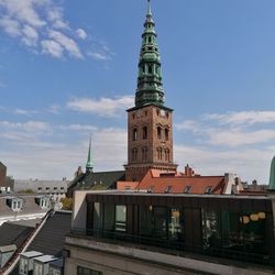 View of buildings against sky in city