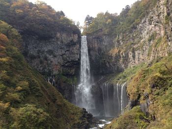 Scenic view of waterfall in forest