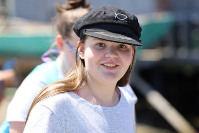 Portrait of smiling girl wearing hat