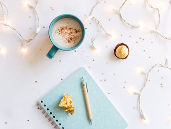 High angle view of coffee cup on table