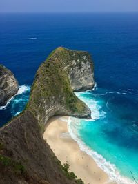 High angle view of sea against blue sky