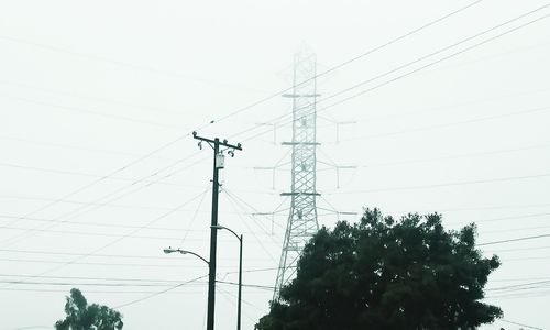 Low angle view of electricity pylon