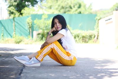 Woman sitting in park