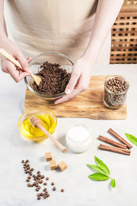 Midsection of woman preparing food