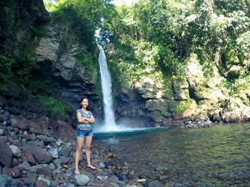 Woman standing on rocks