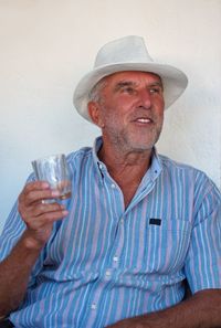 Portrait of man drinking beer glass