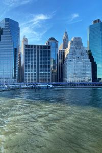 Modern buildings in city at waterfront