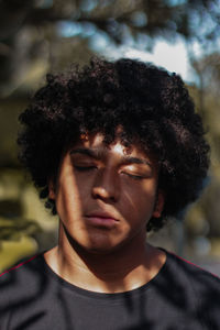 Close-up portrait of a serious young man