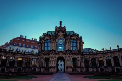 Facade of historic building against blue sky