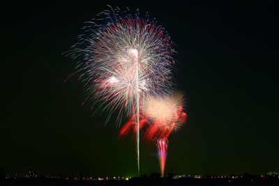 Firework display at night