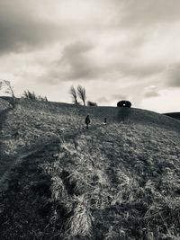 Scenic view of land against sky
