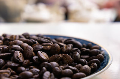 Close-up of coffee beans on table