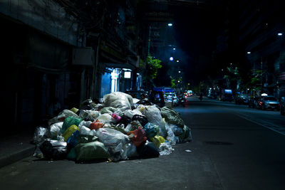 Garbage on street at night