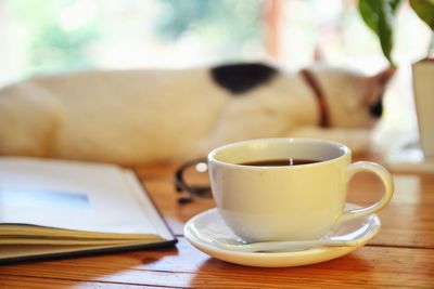 Close-up of coffee cup on table