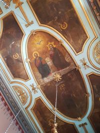 Low angle view of ornate ceiling in building