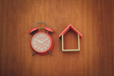 Close-up of clock on table