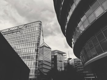 Low angle view of modern buildings against sky