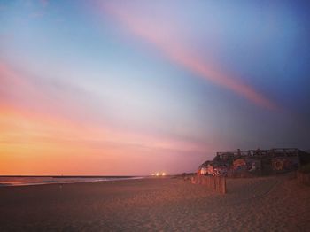 View of beach at sunset