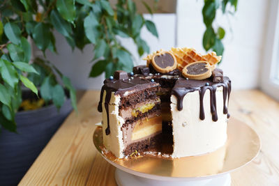 Chocolate cake staying on the window sill 