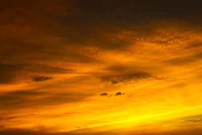 Low angle view of dramatic sky during sunset