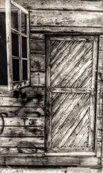 Close-up of window of abandoned building